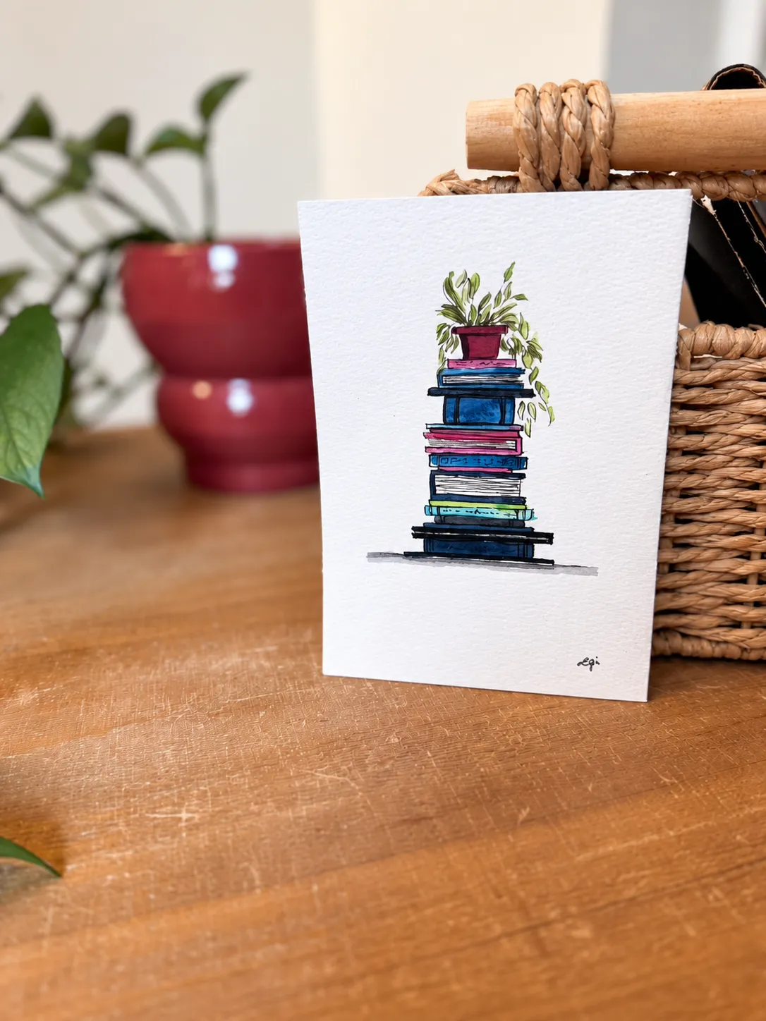 The Reading Nook - Navy standing beside a plant and woven basket