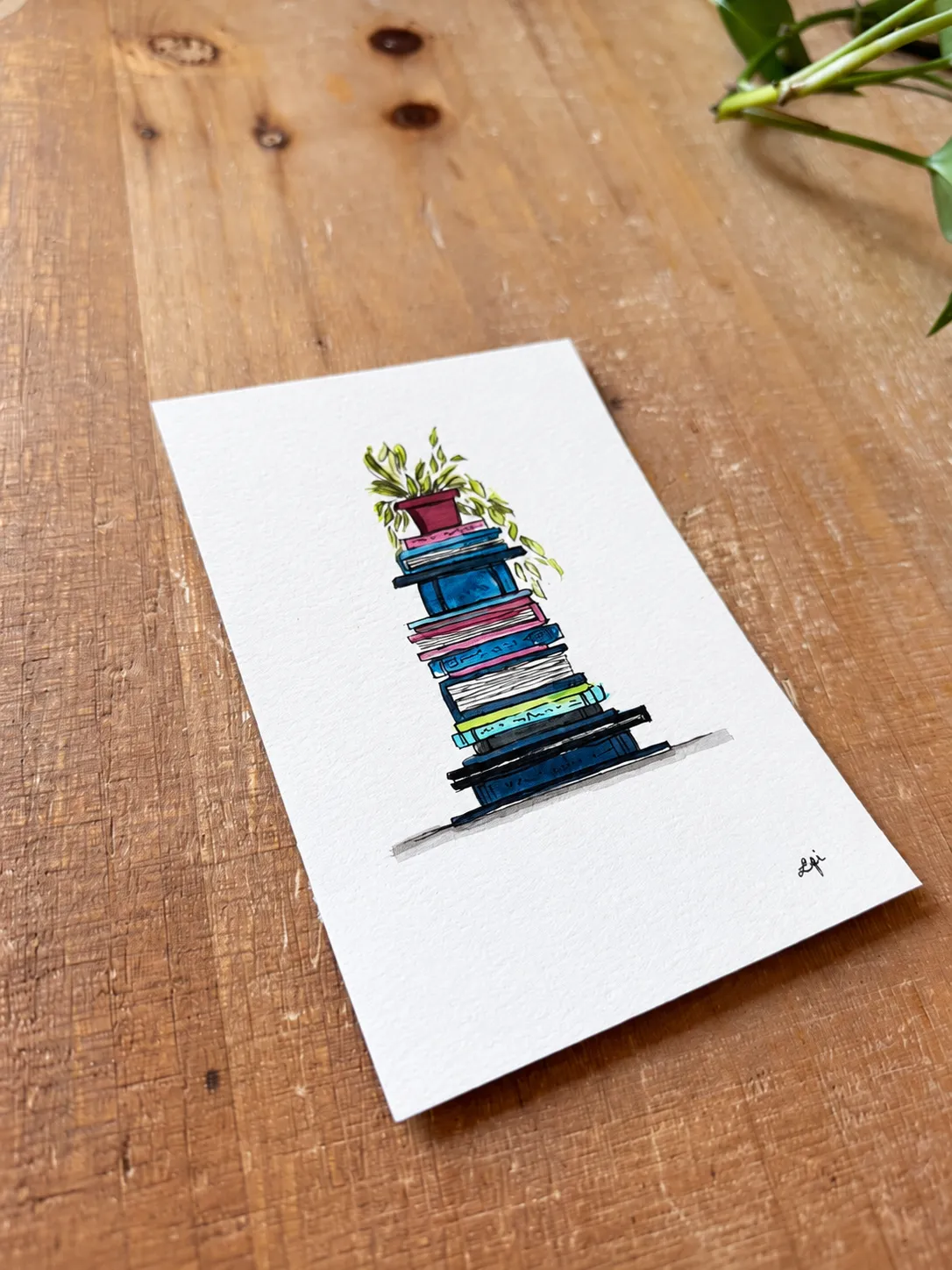 The Reading Nook - Navy viewed at an angle on a wooden table