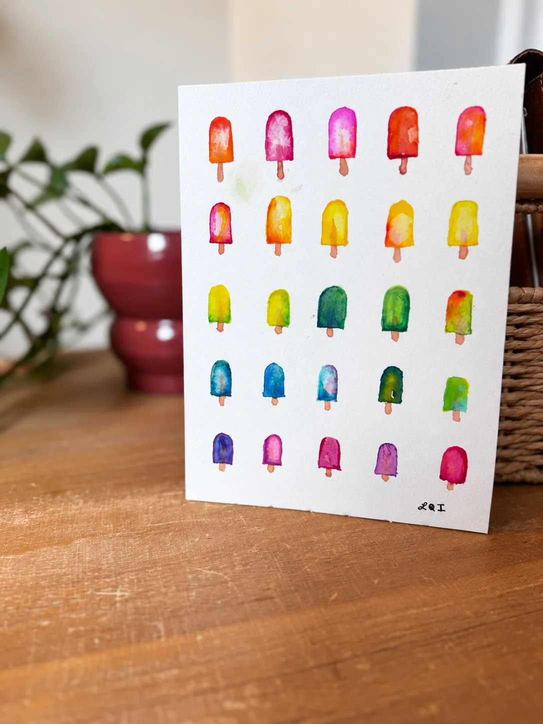 Summer Popsicles standing beside a plant and woven basket