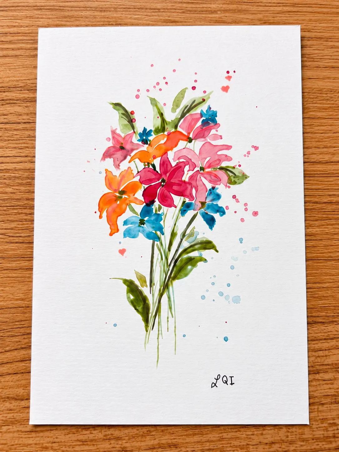 Wildflowers, no. 1 in a close overhead view on a wooden table